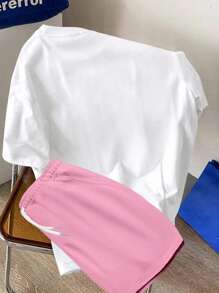 Manfinity Hypemode 2 Stücke Herren Standard Größe Lässig einfaches Buchstaben-Muster weiß Kurzarm T-Shirt und rosa gewebte Shorts Set, Herren Sommer Outfit - Verschiedenfarbig - Übersicht 2