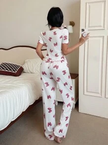 SHEIN Bộ đồ ngủ dệt kim tay ngắn cổ chữ V in nơ màu hồng dành cho nữ Bộ đồ ngủ hai mảnh dành cho nữ Bộ đồ ngủ nơ Bộ đồ ngủ dễ thương Bộ đồ ngủ phù hợp - trắng - Xem 2