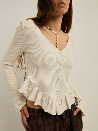  Nöista Elegant White Blouse With Ruffle Trim. Long Sleeve Women's Top Featuring V-Neck, Button Front, And Chic Flared Cuffs. Perfect Formal Blouse For Office Wear, Evening Outfits, Or Layered Chic Looks.