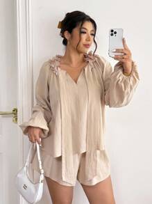 SHEIN Frenchy مجموعة من قطعتين للمرأة ذات الحجم الكبير، ملابس علوية كاجوال طويلة الأكمام وشورت - لون مشمشي - مشاهدة 1
