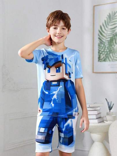 SHEIN 2 件儿童/青少年男童休闲日常百搭舒适印花图案圆领宽松套头衫短袖上衣和短裤针织紧身睡衣套装