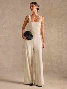 SHEIN BAE Bộ đồ liền thân ống rộng dây mảnh màu đen thanh lịch gợi cảm dành cho nữ với thiết kế nơ hở lưng, thích hợp mặc hàng ngày, hẹn hò, đi chơi, tiệc tùng, tụ tập, trang phục nhiều lớp thanh lịch dành cho nữ, trang phục đi chơi, ngày lễ tình nhân, thường ngày, thanh lịch, đi nghỉ - Màu be - Xem 3