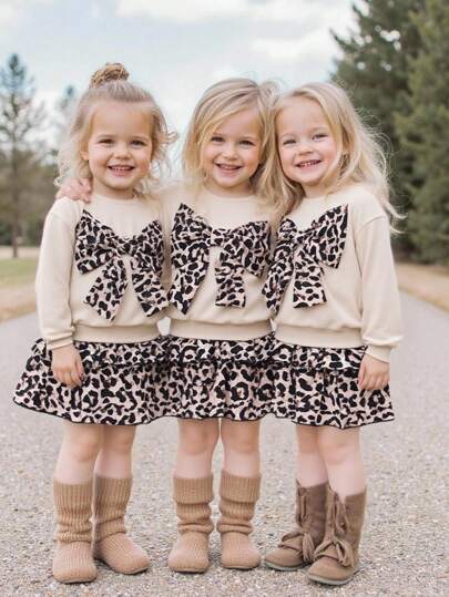 SHEIN 年轻女孩宽松休闲简约舒适圆领卫衣和层叠荷叶边豹纹半身裙套装，适合上学、返校、校服。返校，秋季服装