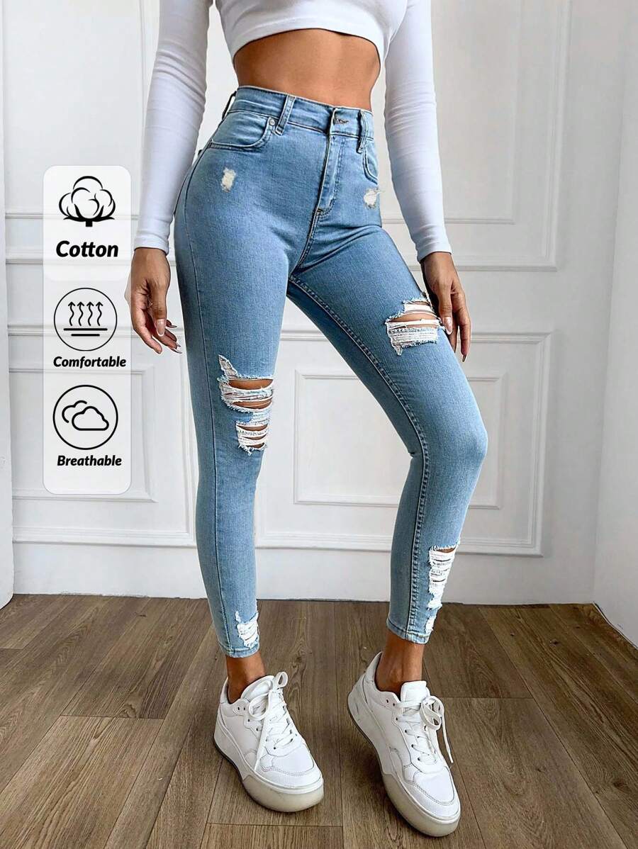 EURMUSE 98%纯棉破洞下摆紧身牛仔裤