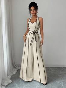 elegante y casual para dama de oficina o maestra, con diseño de alta gama, de color blanco con bloques de color negro, estampado digital, cierre de cremallera, cinturón en la cintura y piernas anchas tipo maxi, con escote en V y cuello halter, en estilo retro de rayas francesas, para primavera/verano. - Albaricoque - Ver 4