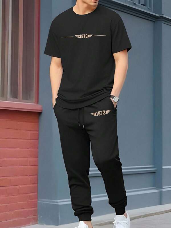 Manfinity Homme 2pcs/Set Casual Round Neck Short Sleeve Top And Drawstring Pants Men Black Two Piece Set