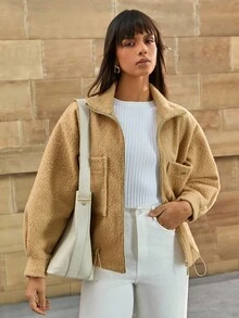 CLARA VERO Veste zippée : Coupe décontractée, idéale pour le port quotidien ou les promenades en extérieur, confectionnée dans un tissu tricoté moelleux avec des poches surdimensionnées et un ourlet à cordon pour le confort