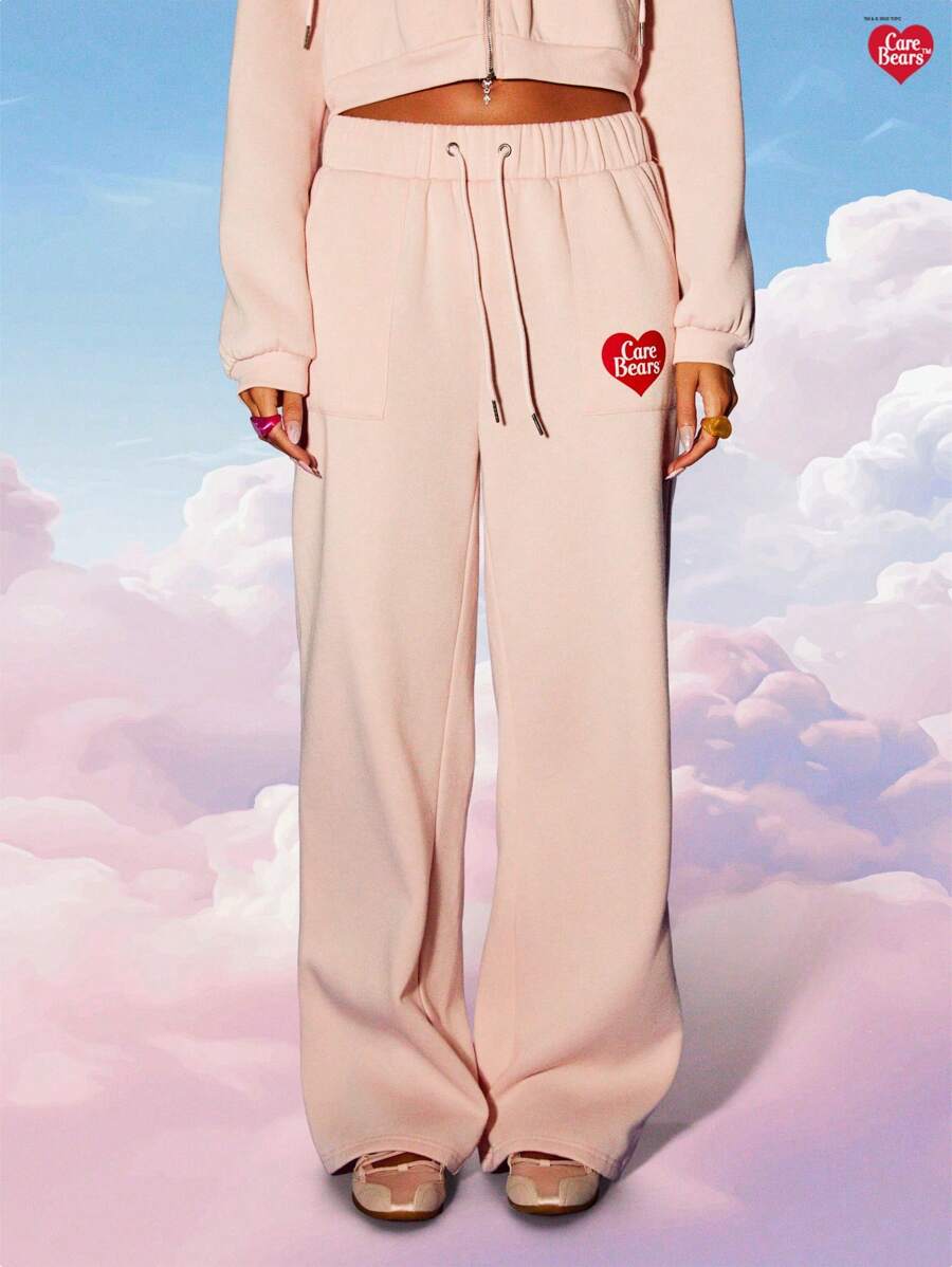 MISSGUIDED x Carebears 舒适慢跑高腰阔腿运动裤，全身印花家居服，可收藏卡通人物街头服饰 Y2K 裤子秋冬系列 - 粉色 - 查看 1