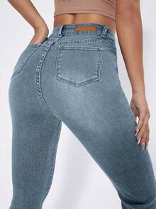 EURMUSE Women's Solid Color Minimalist Daily Wear High Waist Flare Jeans - Light Wash - View 4