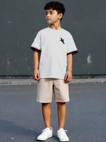 SHEIN Set de 2 piezas de Top de manga corta y pantalones cortos con diseño de patrón escolar y ribete de cinta para niños preadolescentes, adecuado para ir a la escuela, ocio, deporte, primavera/verano, fiestas - Caqui - Ver 7