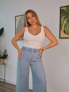 Cioccolato Camiseta sin mangas de punto acanalado con escote en V profundo y espalda de tirantes, color blanco, informal y versátil para mujeres - Blanco - Ver 1