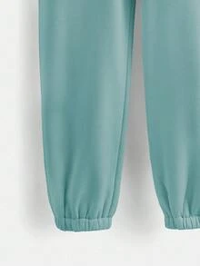 EURMUSE Women's Spring Fashionable Drawstring Solid Grey Sports Cuffs Running Puffy Joggers With Pockets - Mint Green - View 5