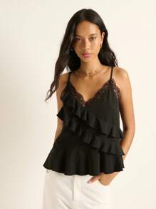 Nöista 吊带上衣饰有荷叶边和精致的蕾丝边，打造出妩媚动人的现代造型，非常适合夜间外出装扮、派对造型和女士冬季叠穿；这款吸睛单品是约会、节日圣诞造型、新年庆祝活动和时尚季节装扮的理想之选。 - 黑色 - 查看 3