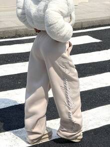 SHEIN EZwear Pantalones de chándal casuales y sueltos con forro térmico y patrón bordado, pantalones de chándal Y2K, pantalones de chándal holgados, otoño - Caqui - Ver 2