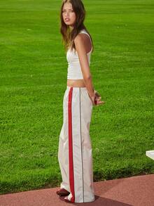 TypaGal These Wide-Leg Track Pants Bring Throwback Energy. With Bold Red Stripes And Print, They're Perfect For 2000s-Style Fall. - Multicolor - View 6
