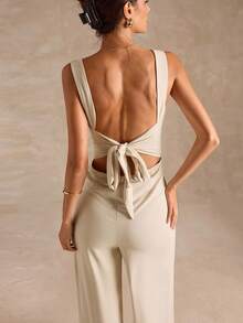 SHEIN BAE Bộ đồ liền thân ống rộng dây mảnh màu đen thanh lịch gợi cảm dành cho nữ với thiết kế nơ hở lưng, thích hợp mặc hàng ngày, hẹn hò, đi chơi, tiệc tùng, tụ tập, trang phục nhiều lớp thanh lịch dành cho nữ, trang phục đi chơi, ngày lễ tình nhân, thường ngày, thanh lịch, đi nghỉ - Màu be - Xem 7