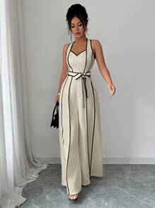 elegante y casual para dama de oficina o maestra, con diseño de alta gama, de color blanco con bloques de color negro, estampado digital, cierre de cremallera, cinturón en la cintura y piernas anchas tipo maxi, con escote en V y cuello halter, en estilo retro de rayas francesas, para primavera/verano. - Albaricoque - Ver 6