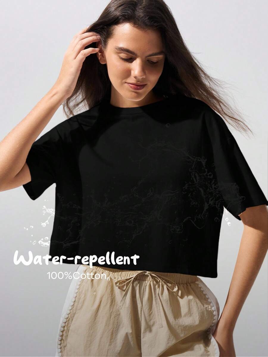 Fluxe Camiseta casual impermeable de mujer de unicolor, cuello redondo, hombros caídos y manga corta