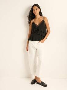 Nöista 吊带上衣饰有荷叶边和精致的蕾丝边，打造出妩媚动人的现代造型，非常适合夜间外出装扮、派对造型和女士冬季叠穿；这款吸睛单品是约会、节日圣诞造型、新年庆祝活动和时尚季节装扮的理想之选。 - 黑色 - 查看 6