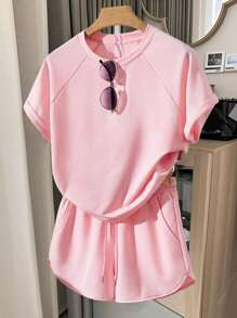 Teenager Mädchen Set aus locker sitzendem rosa Kurzarm T-Shirt und Shorts, lässiger Sportstil für den täglichen Gebrauch, Treffen mit Freunden, Café, Pendeln, entspannte Unternehmungen - Babypink - Übersicht 1