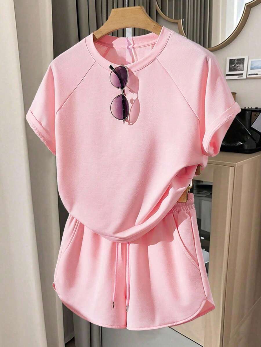 Teenager Mädchen Set aus locker sitzendem rosa Kurzarm T-Shirt und Shorts, lässiger Sportstil für den täglichen Gebrauch, Treffen mit Freunden, Café, Pendeln, entspannte Unternehmungen - Babypink - Übersicht 1
