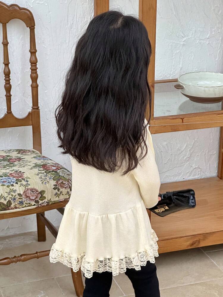 Young Girls Round Neck Ruffle Hem Loose Long Sleeve Sweater