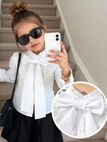 SHEIN 少女休闲百搭纯色梭织大蝴蝶结装饰翻领泡泡袖长袖修身蕾丝荷叶边下摆白色衬衫，羊腿袖纽扣复古尖领前摆弧形下摆白色衬衫，返校季，返校季，夏季上衣，少女服装，娃娃衫，白色上衣，白色衬衫，长袖上衣，可爱上衣，返校季，母女/姐妹装。