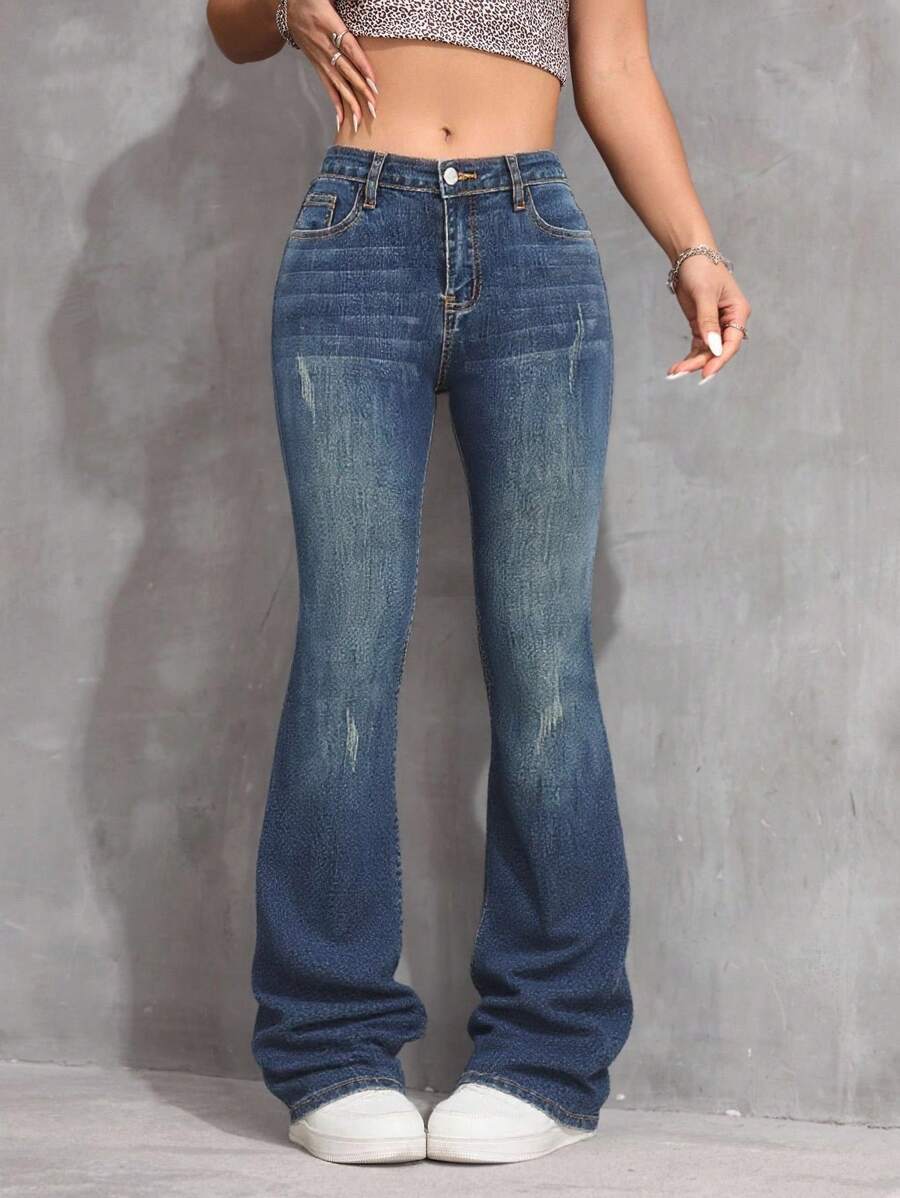 SHEIN بنطلون جينز أزرق كلاسيكي ضيق مرن ذو خصر منخفض وقصة واسعة للمراهقات