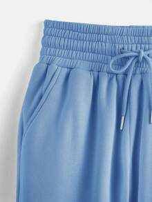 EURMUSE Women's Spring Fashionable Drawstring Solid Grey Sports Cuffs Running Puffy Joggers With Pockets - Baby Blue - View 3