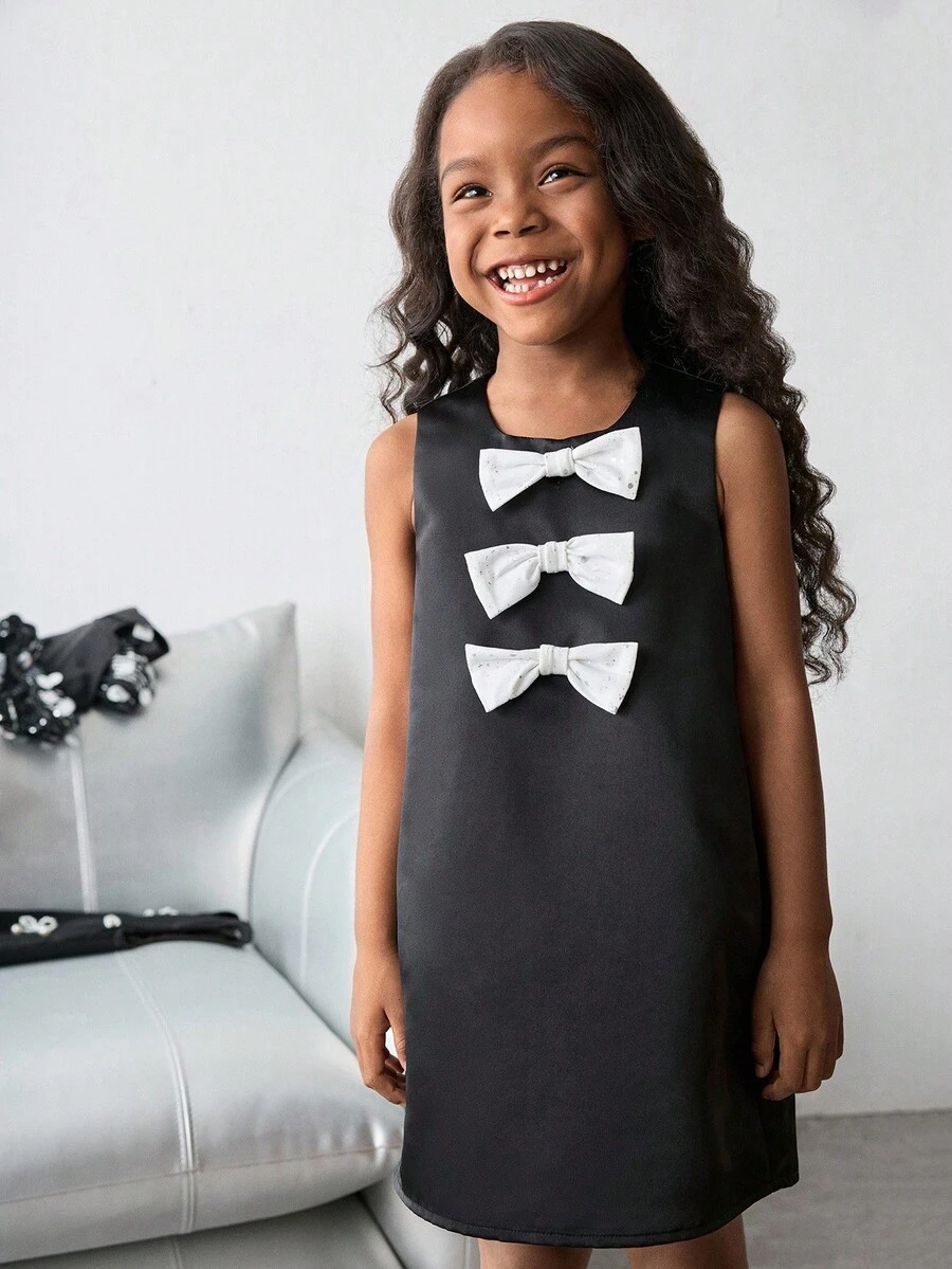Maija Kids Maija Kids Young Girl Sleeveless Dress With Bow Decor Black Dress With White Bows Girls Black Dress With Bow Young Girls Black Dress With Bows Bow Dress Girls - Black - View 1