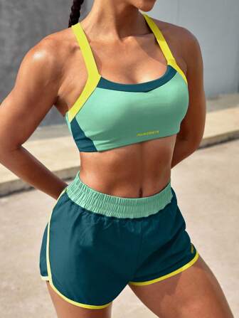 Powerista Conjunto de sujetador deportivo y shorts de bloques de color verde para correr y entrenamiento HIIT para mujeres