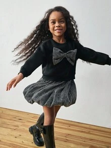 Maija Kids Maija Kids 2 st set med långärmad tröja och kjol, rund halsringning och rosett för unga flickor - Svart - Visa 1
