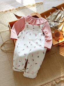 Vintaside Kids 女宝宝两件套，粉色荷叶边圆领长袖上衣搭配白色背带裤，适合春秋季节穿着，甜美可爱。背带裤上印有花卉图案，清新田园风，休闲随性。无论是花园拍照、居家休闲，还是参加派对，都非常适合穿着。 - 彩色 - 查看 1