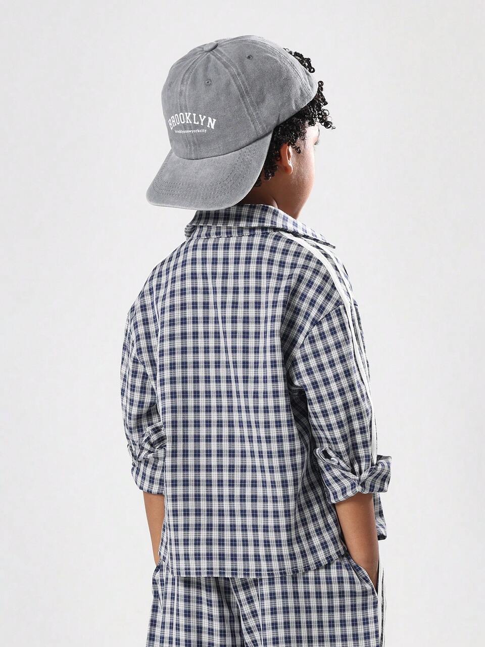 Chemise boutonnée à carreaux avec badge logo