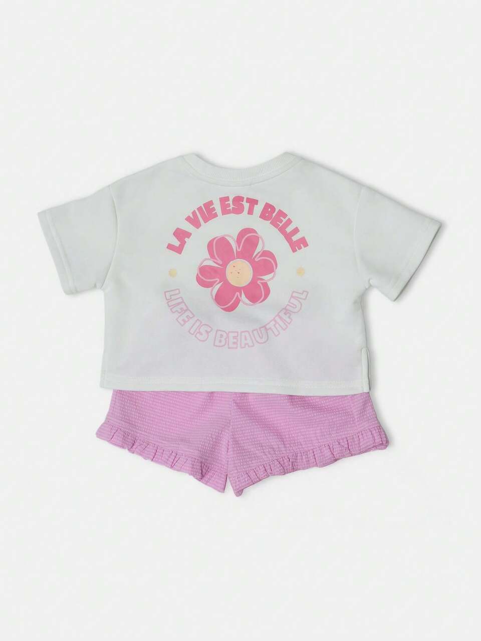 T-shirt con stampa floreale e pantaloncini con orlo arricciato
