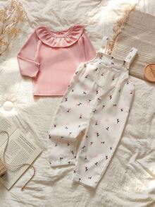 Vintaside Kids 女宝宝两件套，粉色荷叶边圆领长袖上衣搭配白色背带裤，适合春秋季节穿着，甜美可爱。背带裤上印有花卉图案，清新田园风，休闲随性。无论是花园拍照、居家休闲，还是参加派对，都非常适合穿着。 - 彩色 - 查看 4