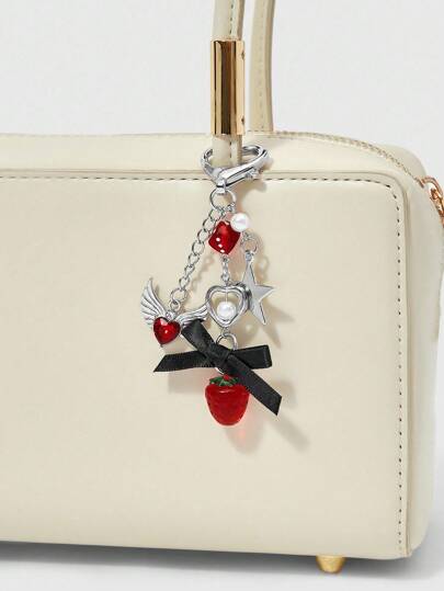 Kawaii 1 pièce Porte-clés pendentif en résine en forme de cœur avec étoile, aile, cristal et nœud papillon au style gothique Y2K argenté. Convient pour le port quotidien des femmes/filles, cadeau de vacances
