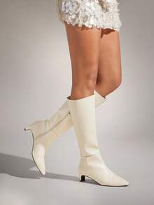 SHUZIA Bottes mi-hautes confortables à fermeture éclair pour femmes, avec talon moyen