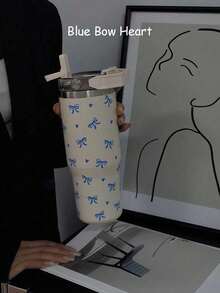 1 قطعة كوب عازل للحرارة والبرودة سعة 900 مل/33.44 أونصة بتصميم قلب وفيونكة، زجاجة مياه كبيرة السعة مع مقبض وقش، غطاء للشرب من الجانبين، للسفر والخارج والرياضة والمدرسة، هدية عيد - متعدد الألوان - مشاهدة 11