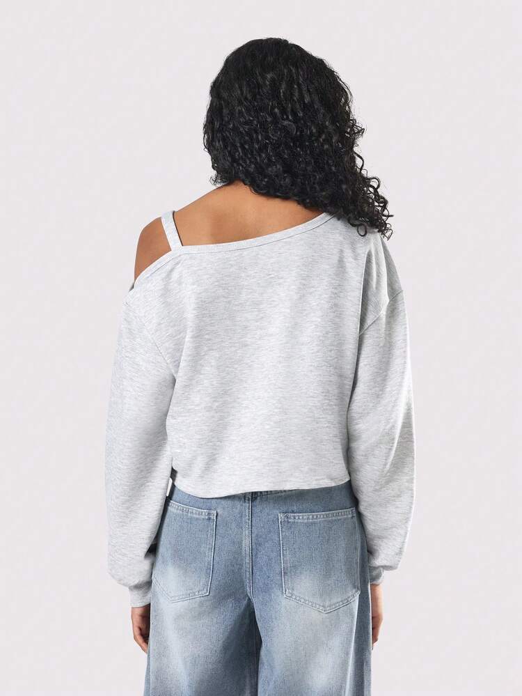 Haut court à épaules dénudées avec imprimé numéro universitaire