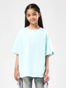 SUMWON Camiseta oversize de color verde menta para adolescentes, de corte relajado, cuello redondo, manga corta, hombros caídos, bajo curvo, básica y esencial para uso diario en verano y primavera - verde menta - Ver 1