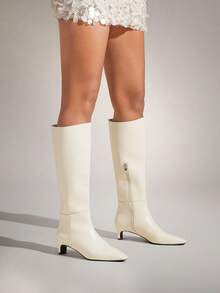 SHUZIA Bottes mi-hautes confortables à fermeture éclair pour femmes, avec talon moyen