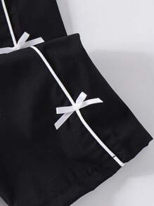 SHEIN Genkimix Kids 女童纯黑色蝴蝶结装饰舒适休闲运动裤，适合夏季、秋季和冬季穿着。