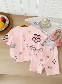 SHEIN 可爱涂鸦脸花心印花，女婴休闲宽松圆领短袖 T 恤和紧身短裤套装，适合春夏季度假 - 彩色 - 查看 2