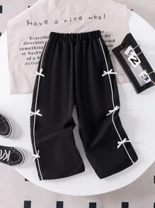 SHEIN Genkimix Kids 女童纯黑色蝴蝶结装饰舒适休闲运动裤，适合夏季、秋季和冬季穿着。