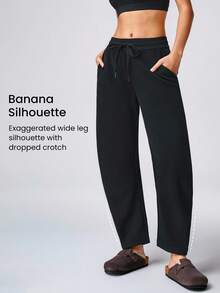 GLOWMODE Cotton-Blend Fleece Loose Fit Banana Silhouette Pocket Joggers Pants Fall Winter - Black - View 2