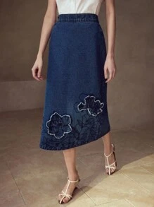 MOTF STUDIO 刺绣不对称下摆牛仔裙