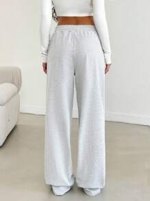 SHEIN Pantalones rectos de cintura media de unicolor para mujeres