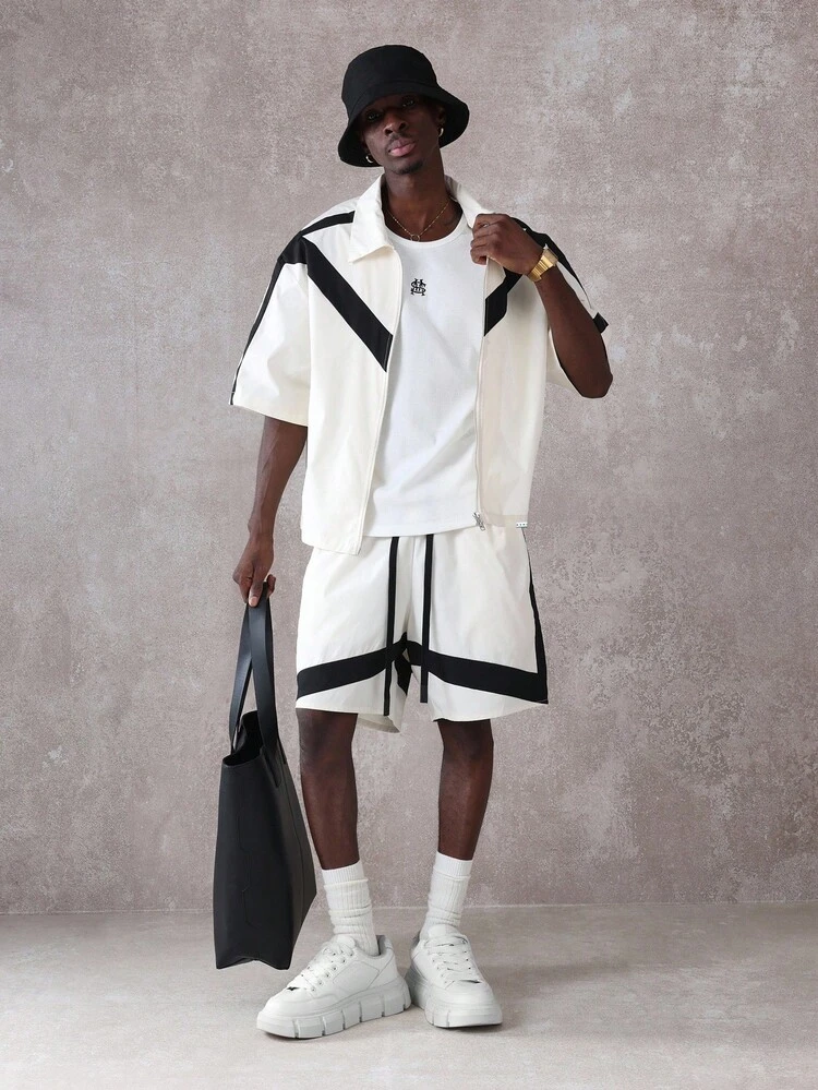 Camisa combina com jaqueta esportiva e shorts