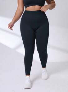 Easithlete Pantalones deportivos de compresión ajustados para mujeres de talla grande con diseño sin costuras y tela de secado rápido para yoga - Azul Marino - Ver 3